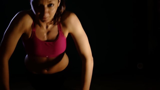 sport fitness,healthy woman training in gym doing a push ups session