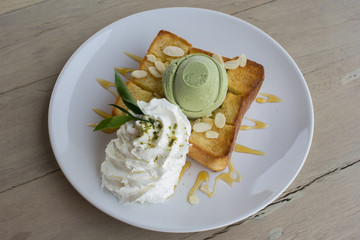Ice cream green tea on honey toast and whip cream