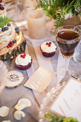 Barn wedding, the design and decoration Candy bar table and honeymooners. Rustic.