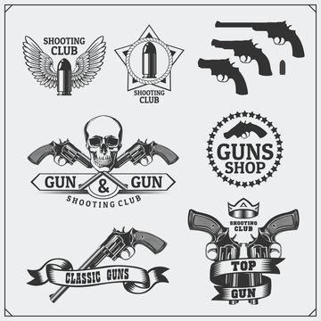 Collection of Gun club emblems, labels and design elements. Revolvers, bullets and target.