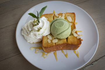 Ice cream green tea on honey toast and whip cream