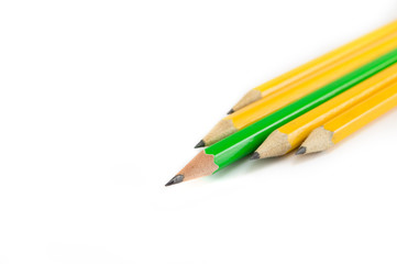 Five pencils on white background