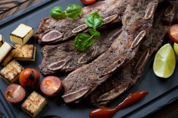 Closeup of grilled beef short ribs, selective focus, studio shot