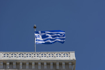 Greek flag waving on the wind
