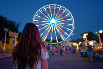 Teen girl  in amusement park