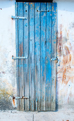 Old wooden door in the port