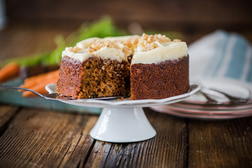 slicing carrot cake, natural light