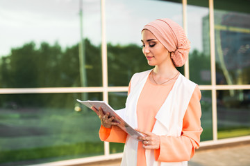 Arab Student holding a folder