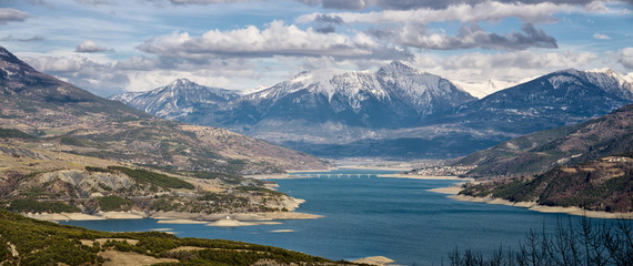 Serre-Poncon Lake winter panoramic view with Savines Le Lac and Saint-Michel Bay. Surrounded by the...