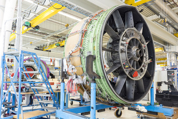 Big airplane engine during maintenance