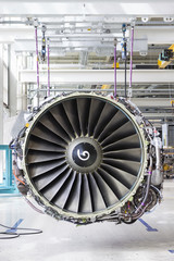 Big airplane engine during maintenance