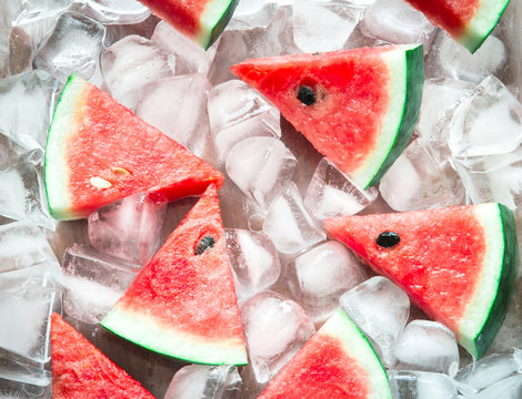 fresh sliced watermelon fruit on cool ice cube  , top above or o