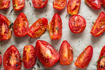 Sun dried tomatoes on white baking paper