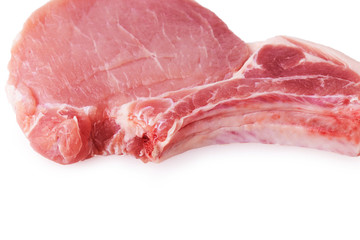 Close view at slice of pork on a bone