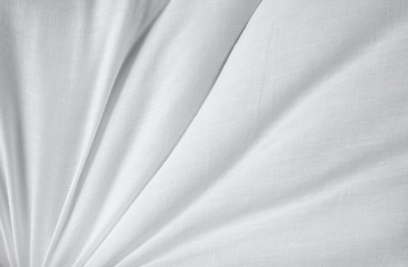 Fototapeta na wymiar A full page of creased white pillow texture