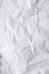 A full page of scrunched up lined writing paper texture