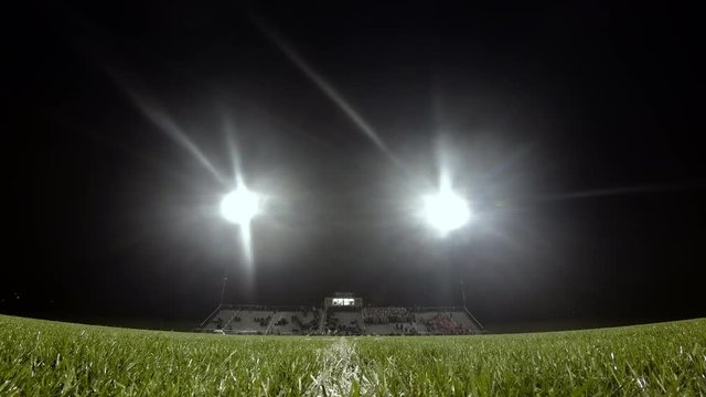 Time-lapse of an American high school football stadium at half time, 4k
