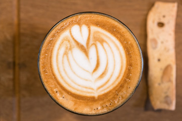  cup of coffee with heart pattern
