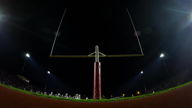 Time-lapse of an American high school football stadium at half time, 4k