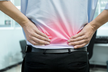 Man feeling back pain