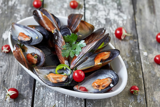 Delicious mussels with sauce. top view