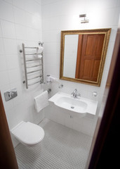 Classic elegant white bathroom, hotel bathroom, small cozy bathroom, 