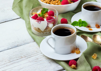 Breakfast concept. Coffee muesli granola berries homemade yogurt