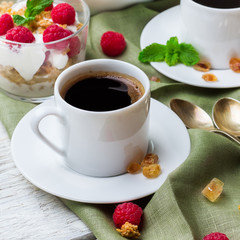 Breakfast concept. Coffee muesli granola berries homemade yogurt