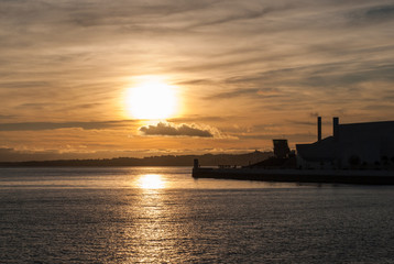 Walking along Rio Tajo in Lisbon Portugal at Golden Hour