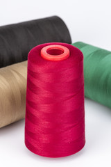 Red Sewing Thread on white background