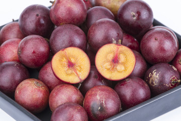 Fruit fresh Ramontchi on black dish