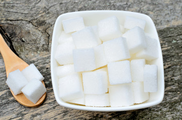Sugar cubes in a ceramic bowl