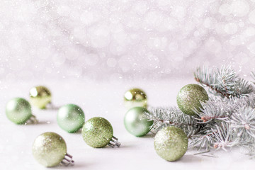 Christmas background with decorations on wooden board. Soft focus.