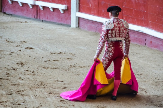 Torero holding his capote