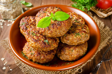 Juicy delicious cutlets with oatmeal. Rustic style