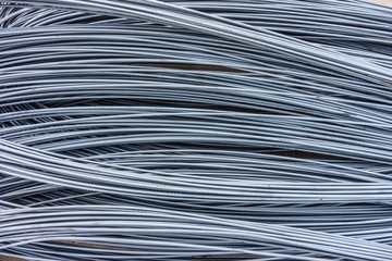 Heap of iron wires. The metal materials for construction works.