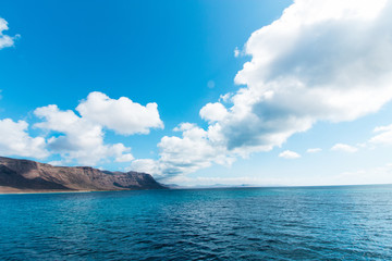 Fototapeta na wymiar Coast at Lanzarote La Graciosa, Lanzarote, Canary Islands, Spain