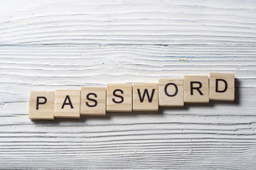 password word on wooden cube at wood background