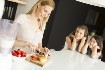 Mother and daughter in the kitchen