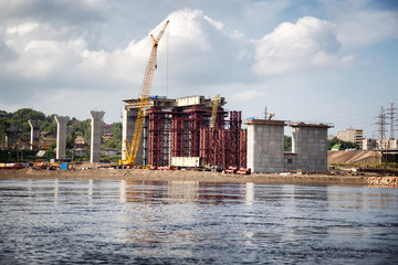 Construction of a new road bridge across the Yenisei River in Krasnoyarsk, Russia
