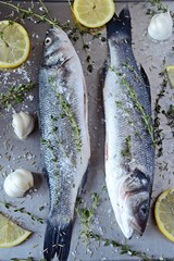 Raw Sea Bass Fish with spices and herbs, top view