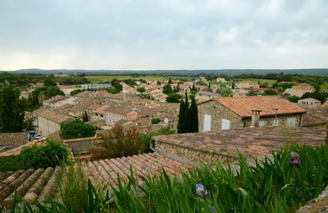 Fototapeta na wymiar View on Grignan buildings' roofs from Grignan castle hill, France