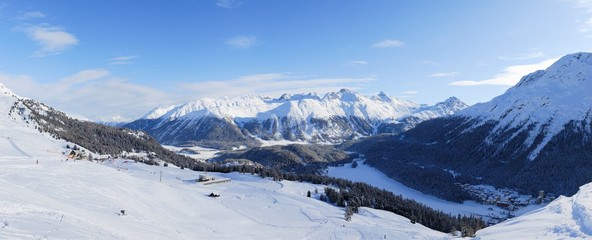 Winter panoramic view with mountains around the valley. Over St. Moritz, Engadin, Switzerland.