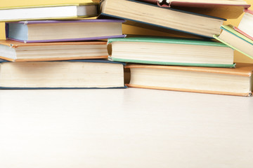 Stack of colorful books. Education background. Back to school. Copy space for text.