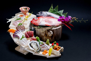 Sashimi - Freshness Japanese food sashimi set on a dark background - obrazy, fototapety, plakaty
