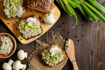 Slice of whole wheat toast with mushroom spread with Roquefort cheese and leek