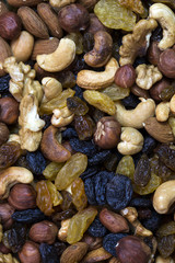 background mix of nuts and raisins shot close-up