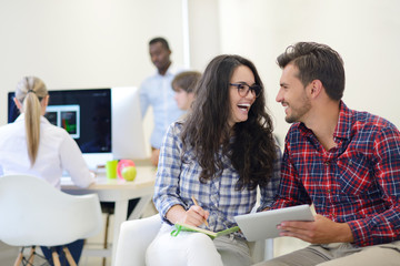 Fototapeta premium business couple working together on project at modern startup office