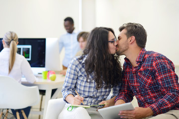 business couple working together on project at modern startup office