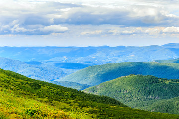 Naklejka na ściany i meble Picturesque Carpathian mountains landscape, view from the height, Ukraine.